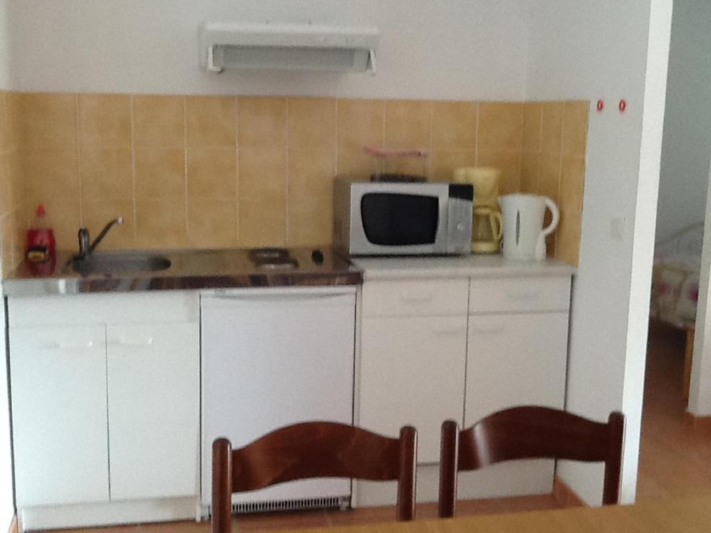 Appartements " Le Clos De La Cerisaie" Castillon-du-Gard Kamer foto